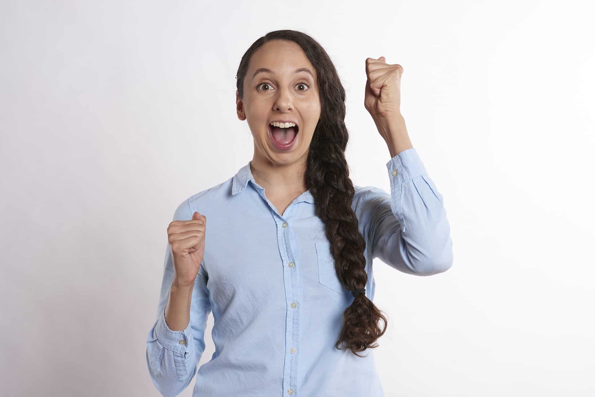 A happy person who knows how to improve her personal growth